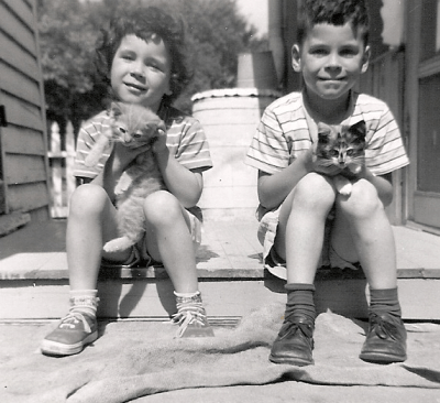 Connie Van Hoven with brother and kittens